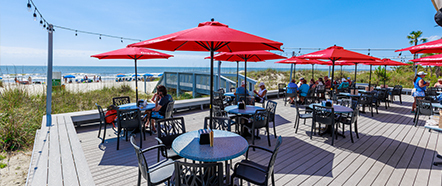 Palmetto Dunes Oceanfront Resort. red umbrellas on tables