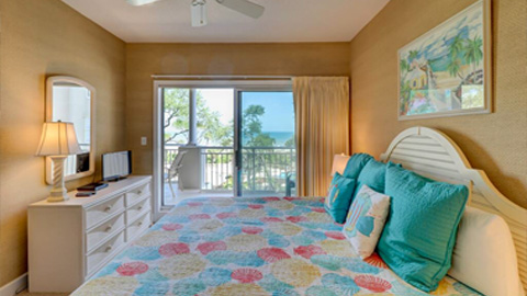 6301 HAMPTON PLACE. a bedroom with ocean view