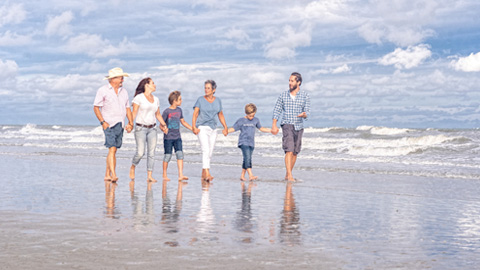 Beach Photography Hilton Head. A family walking down a beach