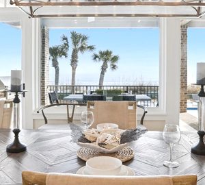 Beach Properties. a dining room with windows
