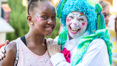 Celebrate Memorial Day on Hilton Head. a clown and a tween girl