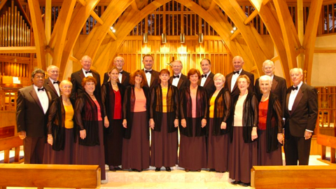  Hilton Head Choral Society. Men and women dressed up in a church