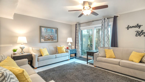 Stones Throw 26. A living room with white sofas