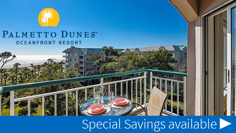 Palmetto Dunes Oceanfront Resort®. a balcony with a chair and table overlooking the ocean