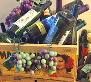 Wine Tasting Tips. a wood crate filled with wine bottles