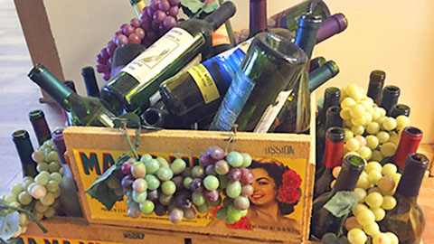 Wine Tasting Tips. a wood crate filled with wine bottles