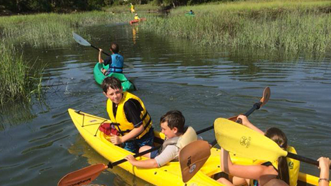 kids in kayaks