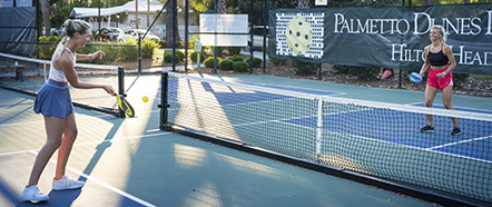 Palmetto Dunes Tennis. two people playing pickle ball