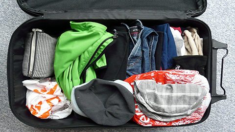 Hilton Head Packing List: What to Bring for Your Trip. a packed suitcase